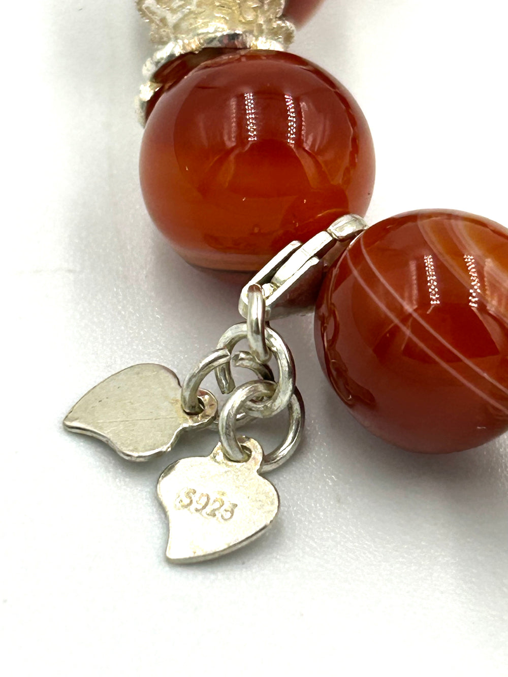 woman bracelet made of carnelian gemstones and silver.