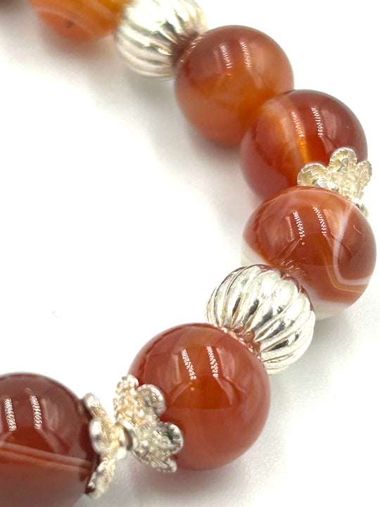 woman bracelet made of carnelian gemstones and silver.